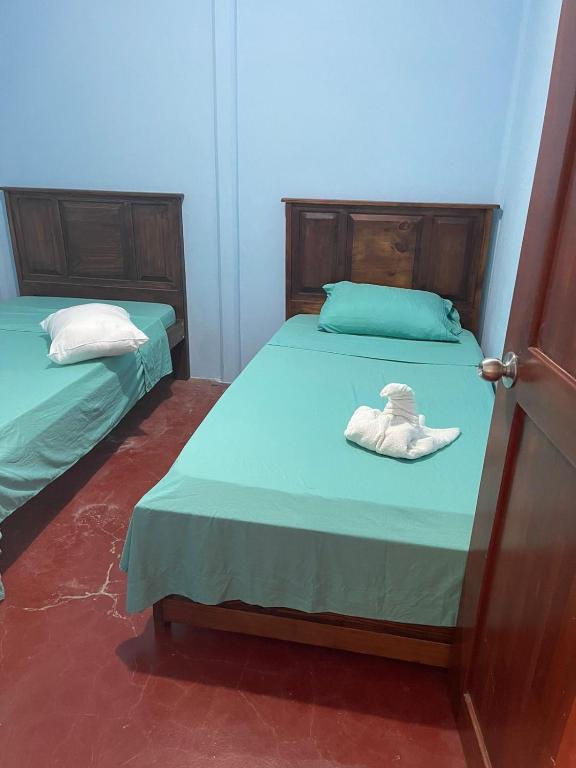 Postel nebo postele na pokoji v ubytování Casa Tabacon cr