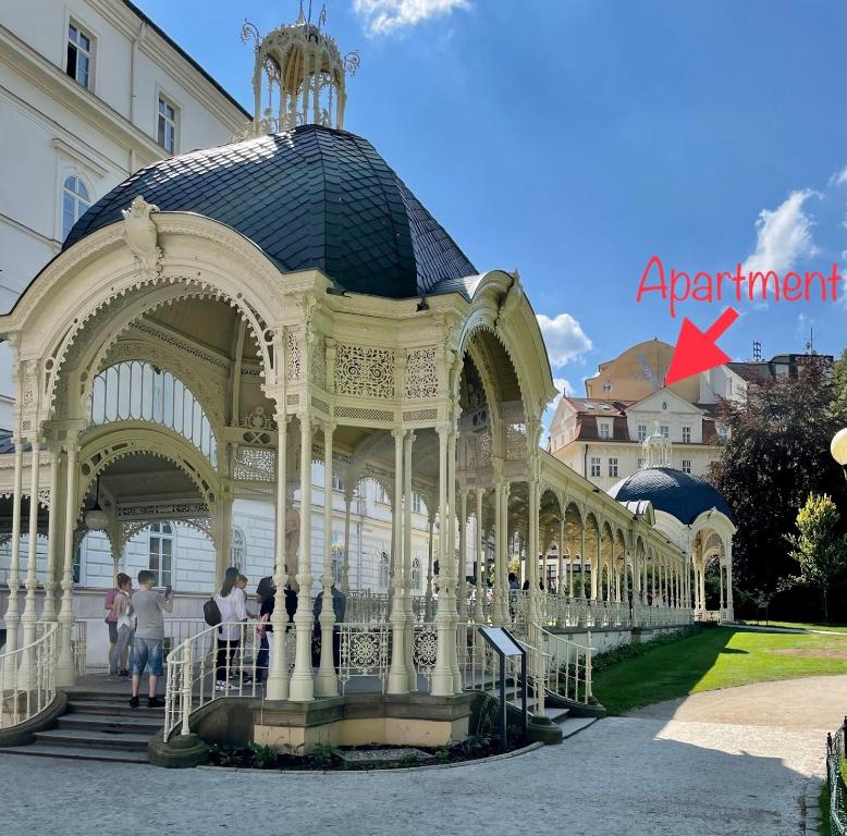 a large gazebo in the middle of a building at Huge two floor apartment on the Park Colonnade with free parking for one car, 160 sqm in Karlovy Vary