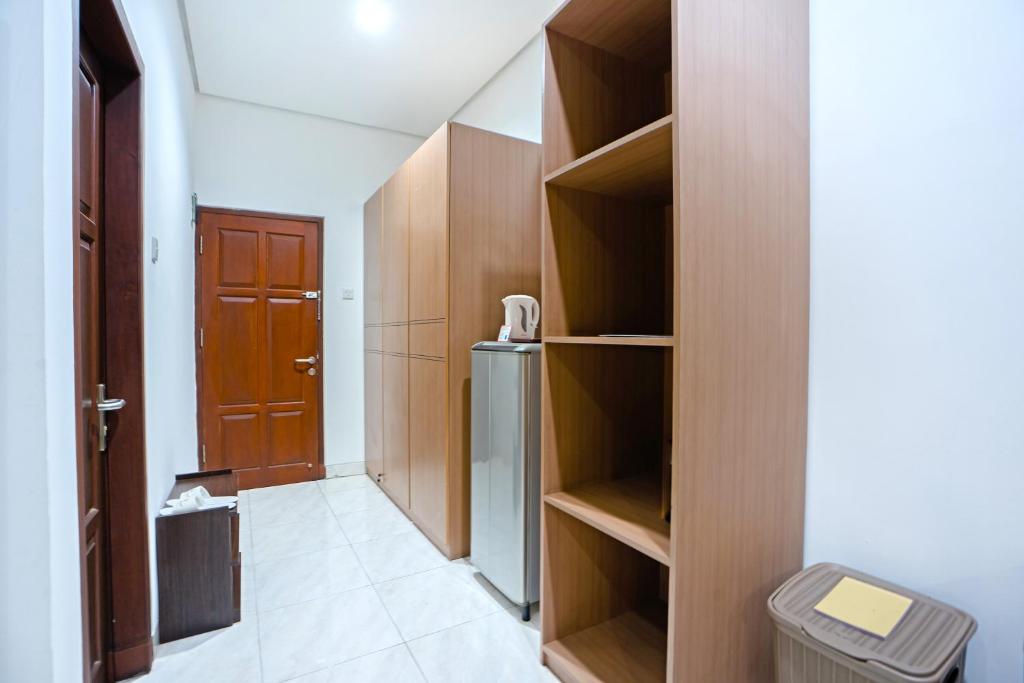 Kuchyň nebo kuchyňský kout v ubytování Jambuluwuk Residence Pakubuwono