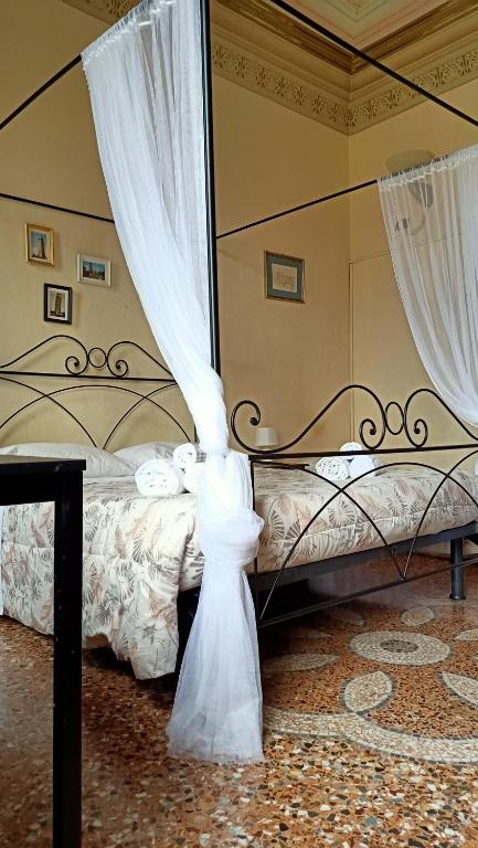 Postel nebo postele na pokoji v ubytování Dimora del Conte