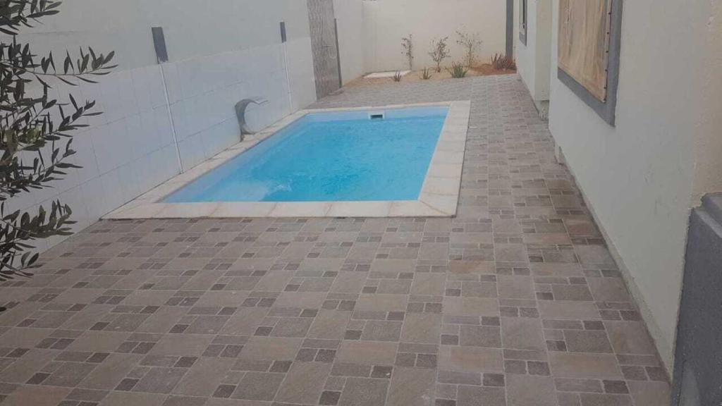 Bazén v ubytování Djerba La Douce nebo v jeho okolí