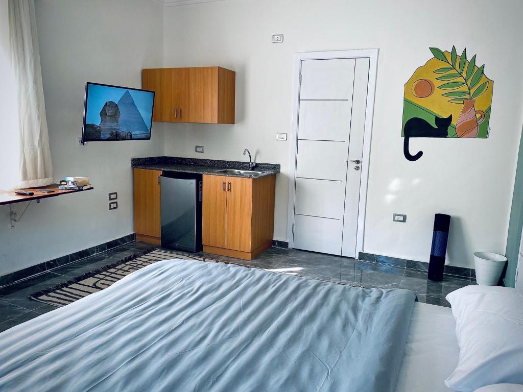 Kuchyň nebo kuchyňský kout v ubytování Maadi Groove Guesthouse