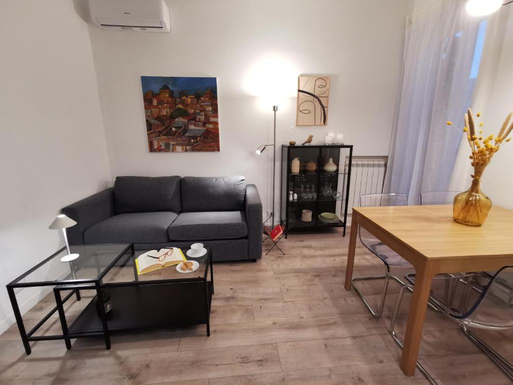 Et opholdsområde på Casarino House Luxury Apartment