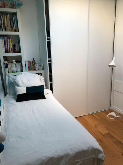 Un ou plusieurs lits dans un h&eacute;bergement de l&#39;&eacute;tablissement Appartement cosy esprit loft