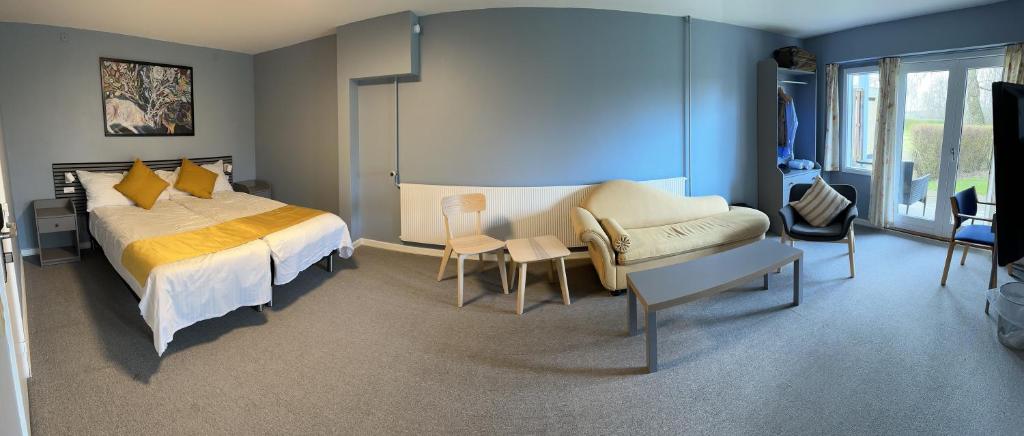 Postel nebo postele na pokoji v ubytování Lynge kro & Hotel