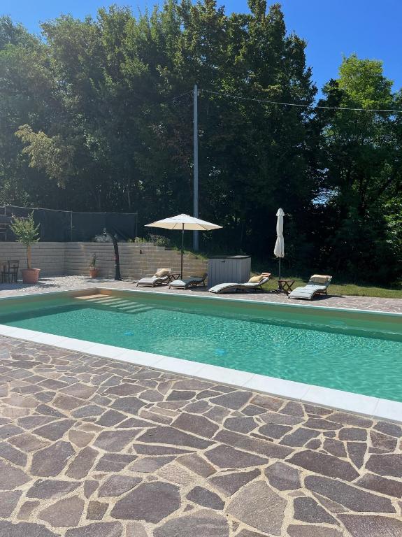 Bazén v ubytování Casa Al Fondo nebo v jeho okolí