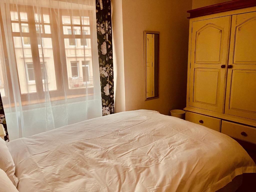 Voodi või voodid majutusasutuse Georgian Guest Rooms toas