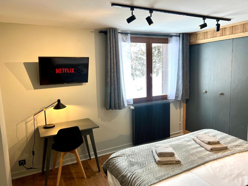 Postel nebo postele na pokoji v ubytování Appartements Chalet Lauranoure Centre Station