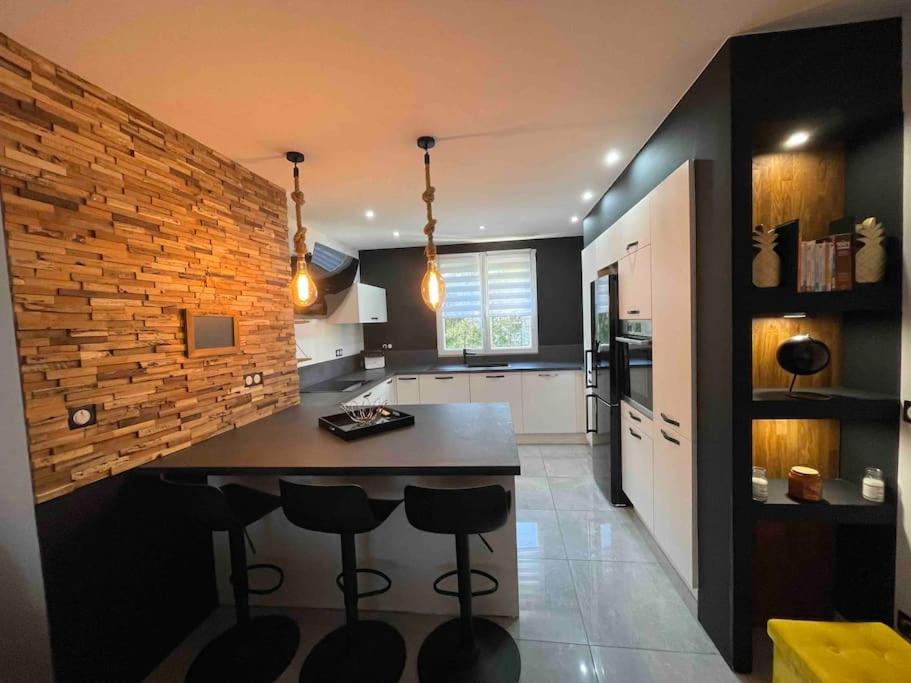 Kuchyň nebo kuchyňský kout v ubytování Duplex cosy Nancy à 10 minutes