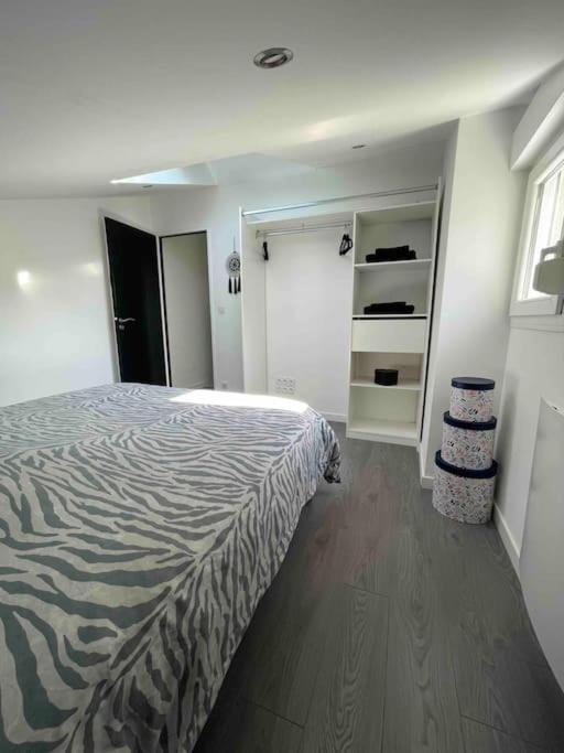 Postel nebo postele na pokoji v ubytování Duplex cosy Nancy à 10 minutes