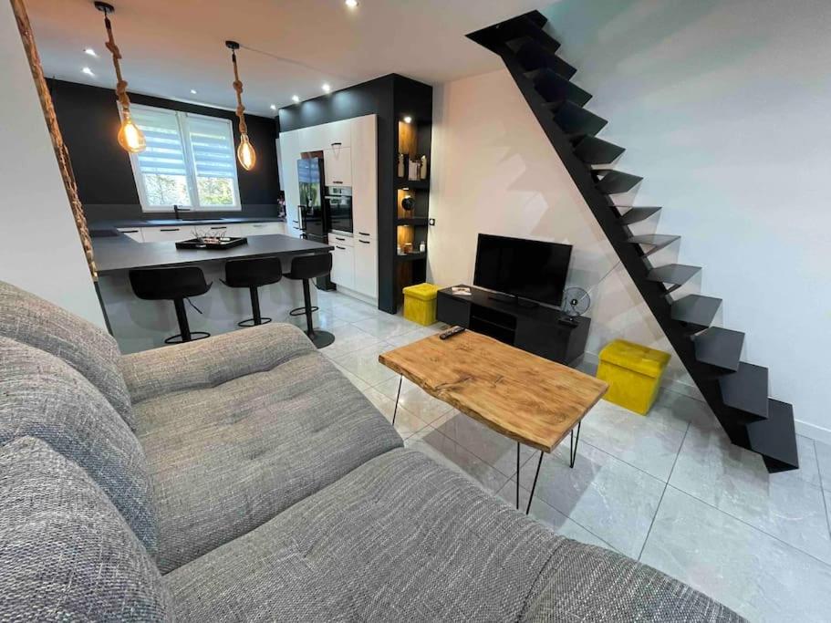Posezení v ubytování Duplex cosy Nancy à 10 minutes