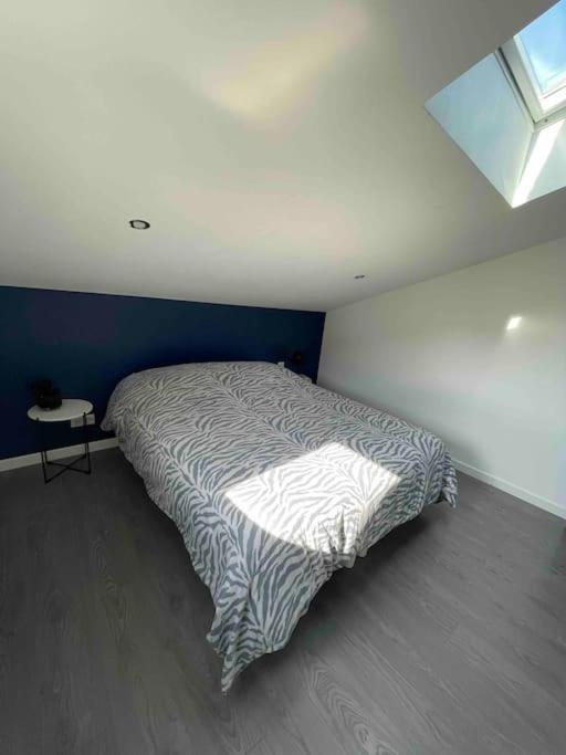 Postel nebo postele na pokoji v ubytování Duplex cosy Nancy à 10 minutes