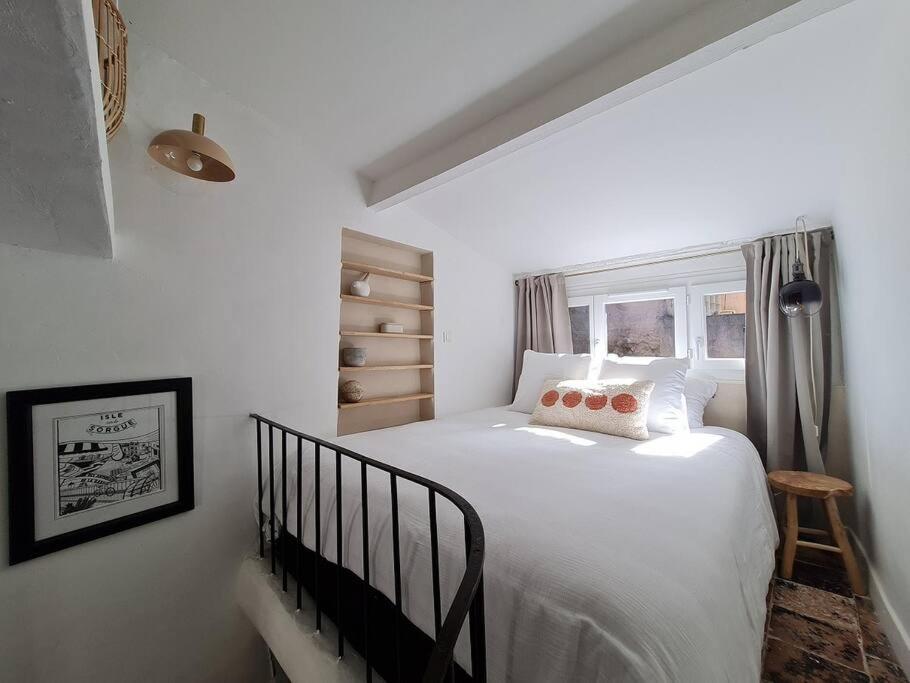 Posteľ alebo postele v izbe v ubytovaní Appartement avec terrasse sur les toits classé 5*