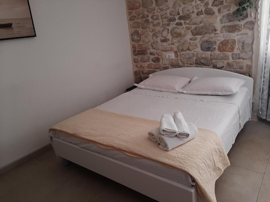 Postel nebo postele na pokoji v ubytování Violet