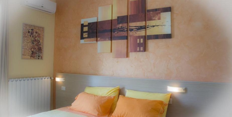 Postel nebo postele na pokoji v ubytování B&B Portacastello