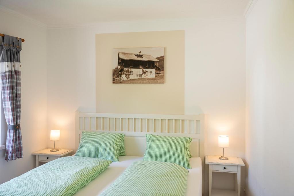 Postel nebo postele na pokoji v ubytování Landhaus Aubauerngut