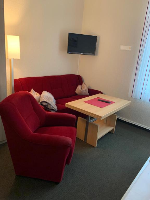 TV a/nebo společenská místnost v ubytování Pension Haus Beckmann
