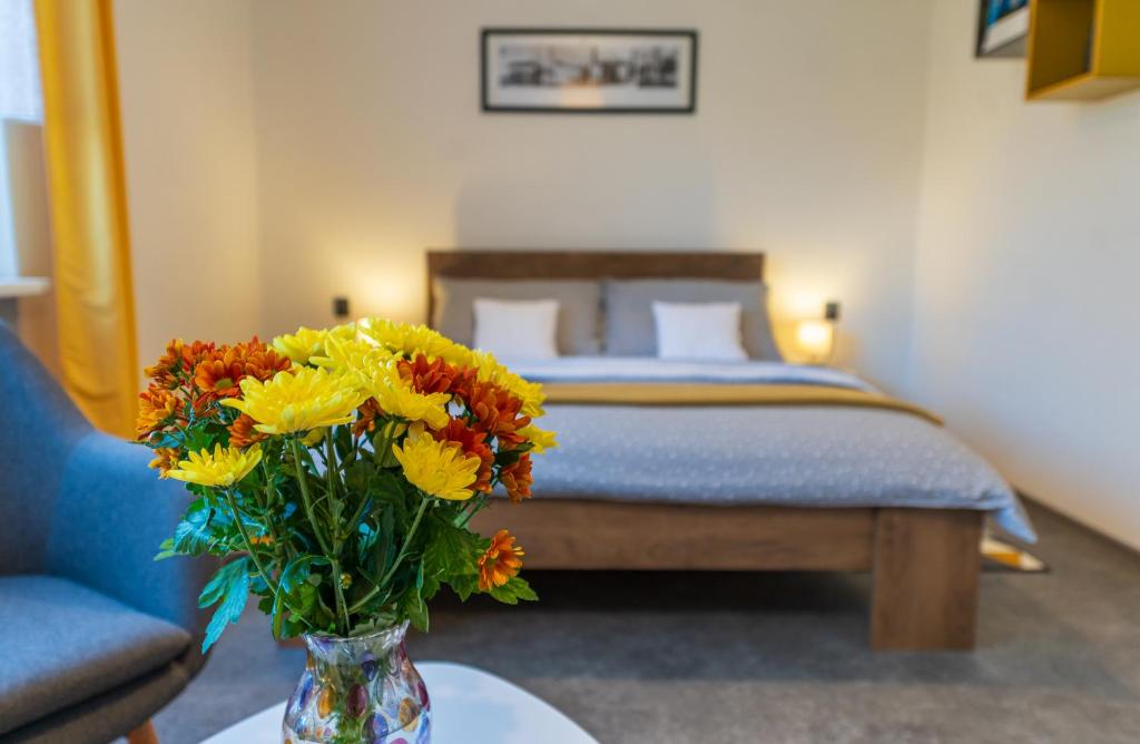 Postel nebo postele na pokoji v ubytování Ubytování na samotě - Apartmán U Tesařů