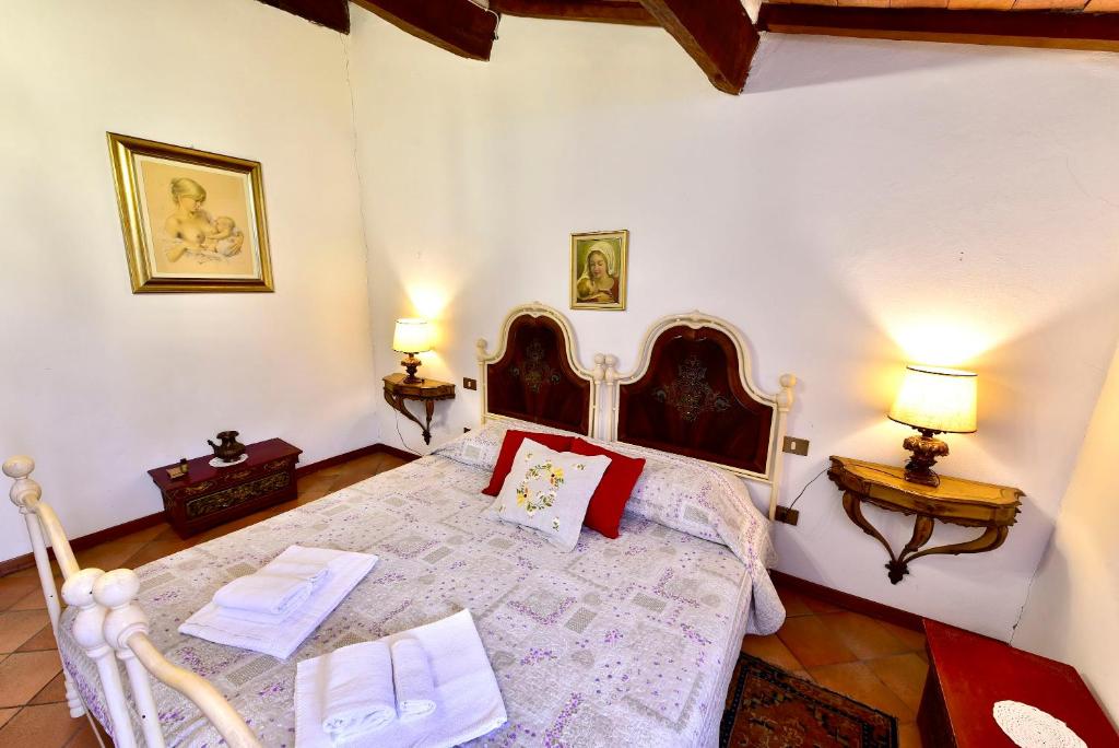 Postel nebo postele na pokoji v ubytování Agriturismo Corvaia