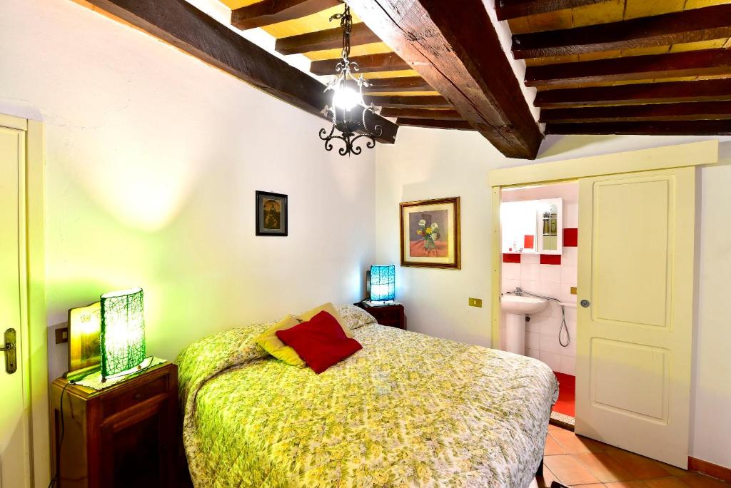 Postel nebo postele na pokoji v ubytování Agriturismo Corvaia