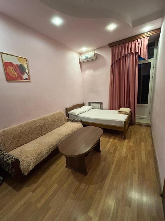 Letto o letti in una camera di Manand Hotel