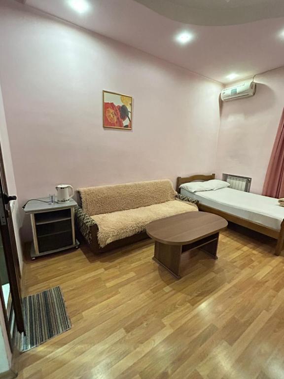Letto o letti in una camera di Manand Hotel