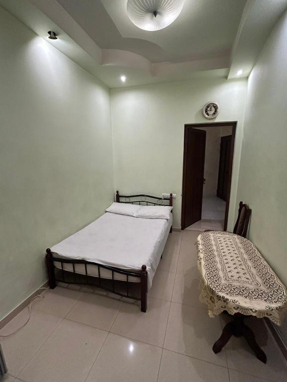 Letto o letti in una camera di Manand Hotel