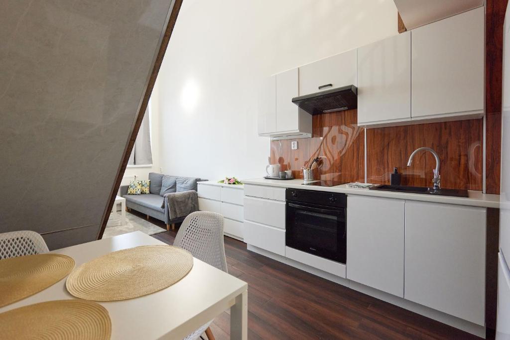 Kuchyň nebo kuchyňský kout v ubytování Block 96 Apartments