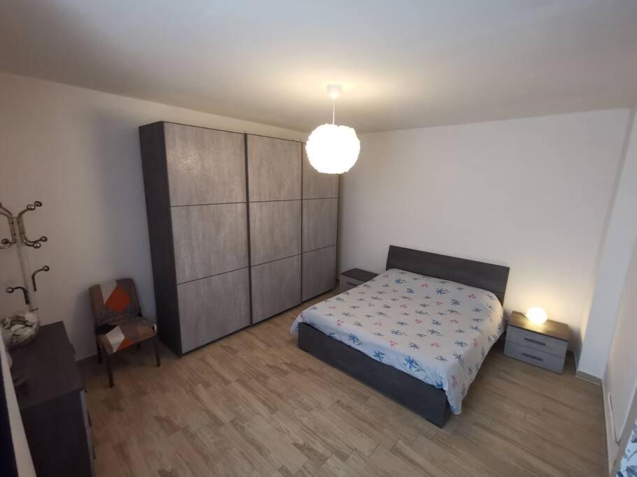 Postel nebo postele na pokoji v ubytování Casa indipendente - Piccolini Hideaway