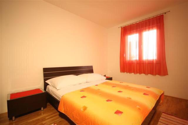 Posteľ alebo postele v izbe v ubytovaní Apartments Beverly