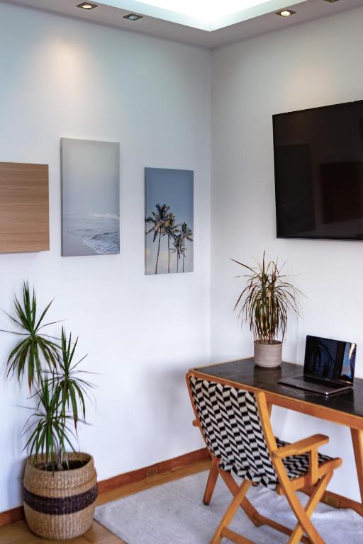 TV a/nebo společenská místnost v ubytování Panorama Loft