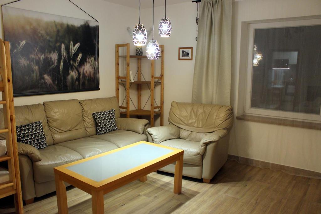 Posezení v ubytování Apartmány Pekárna