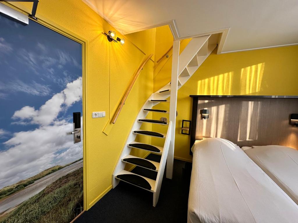 Postel nebo postele na pokoji v ubytování Hotel Nap