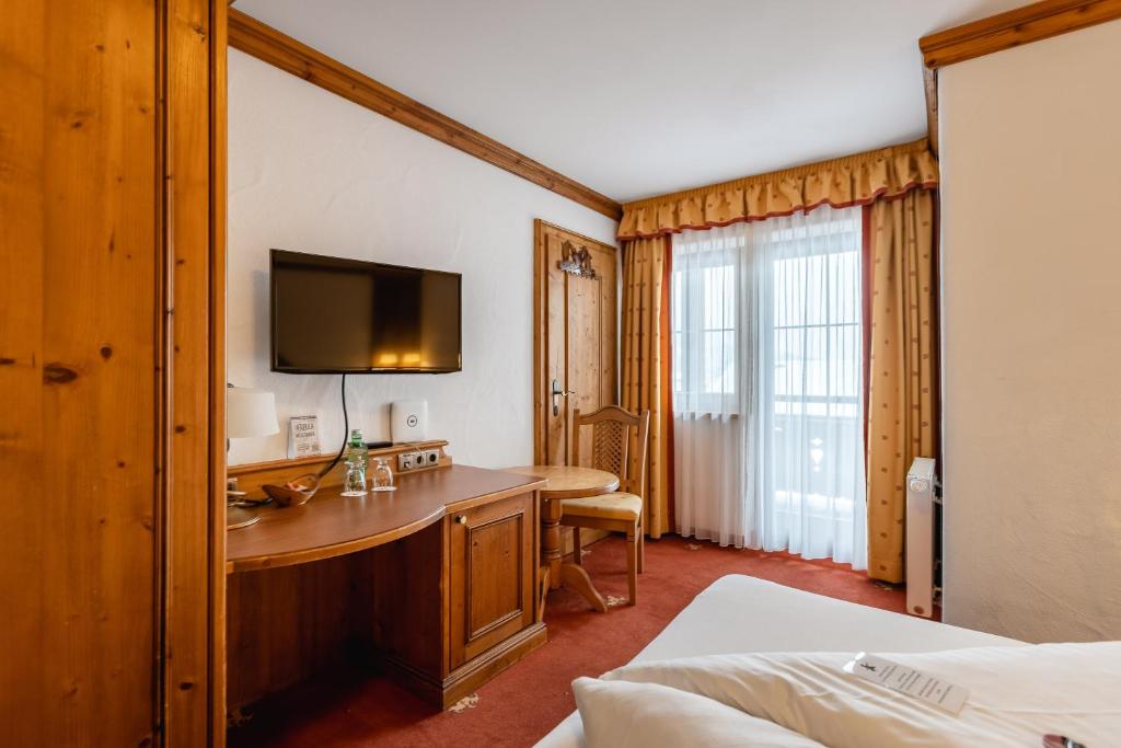 Letto o letti in una camera di Hotel Restaurant Hexenalm