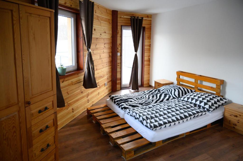Postel nebo postele na pokoji v ubytování Chata Exit