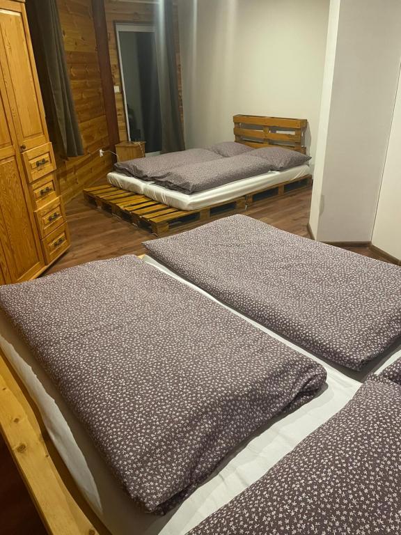 Postel nebo postele na pokoji v ubytování Chata Exit