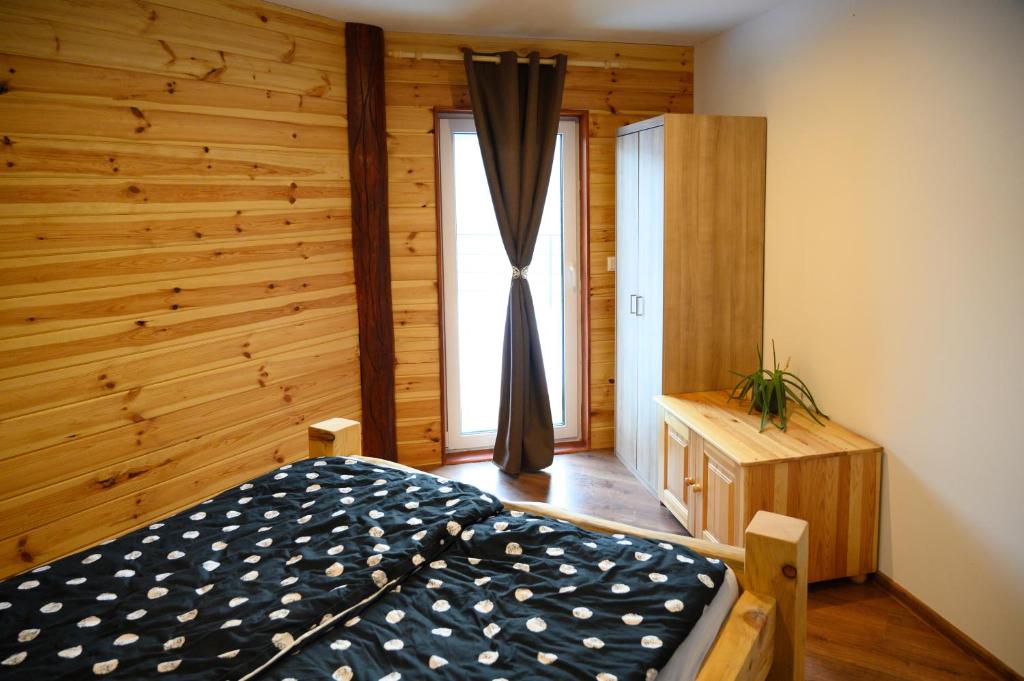 Postel nebo postele na pokoji v ubytování Chata Exit