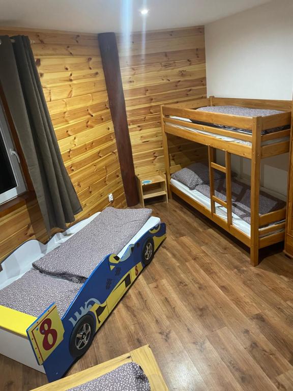 Postel nebo postele na pokoji v ubytování Chata Exit
