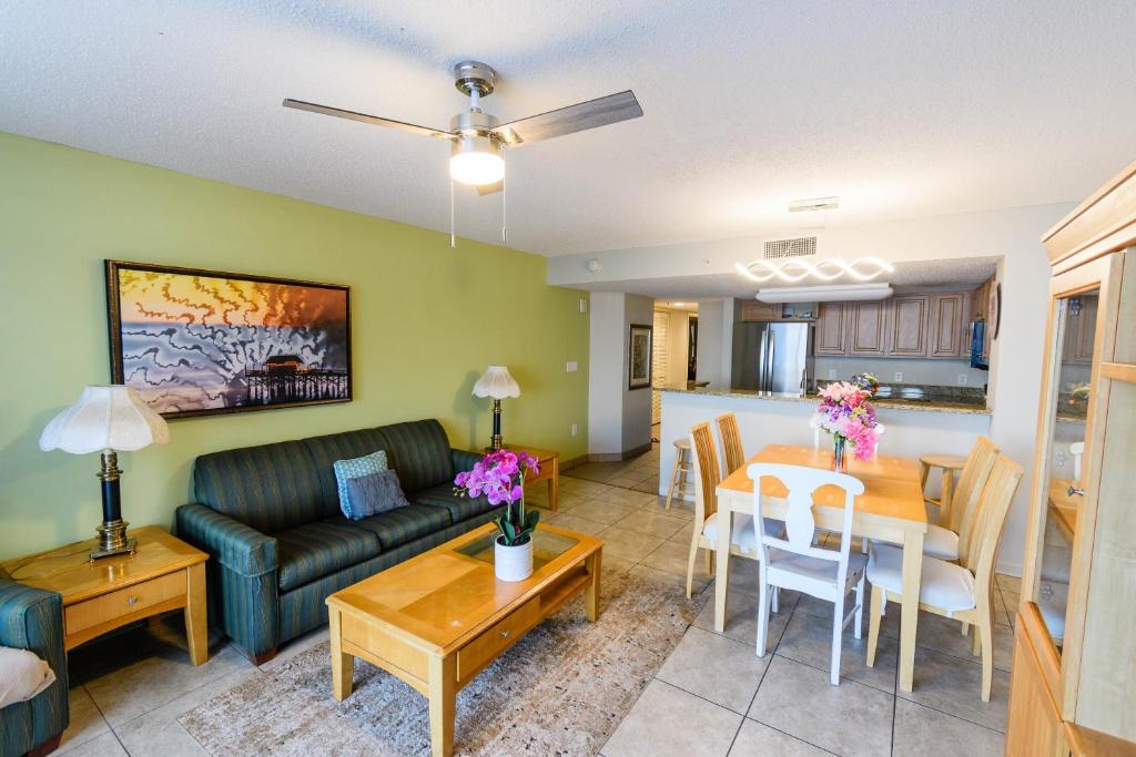 a living room with a couch and a table at Atlantica Resort in Myrtle Beach