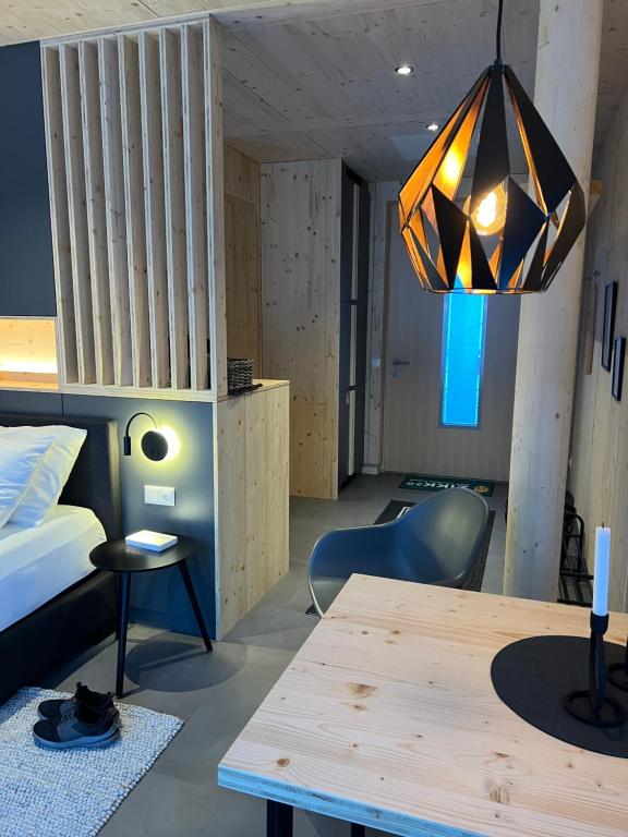 Postel nebo postele na pokoji v ubytování roo'n Lodges#KOLM