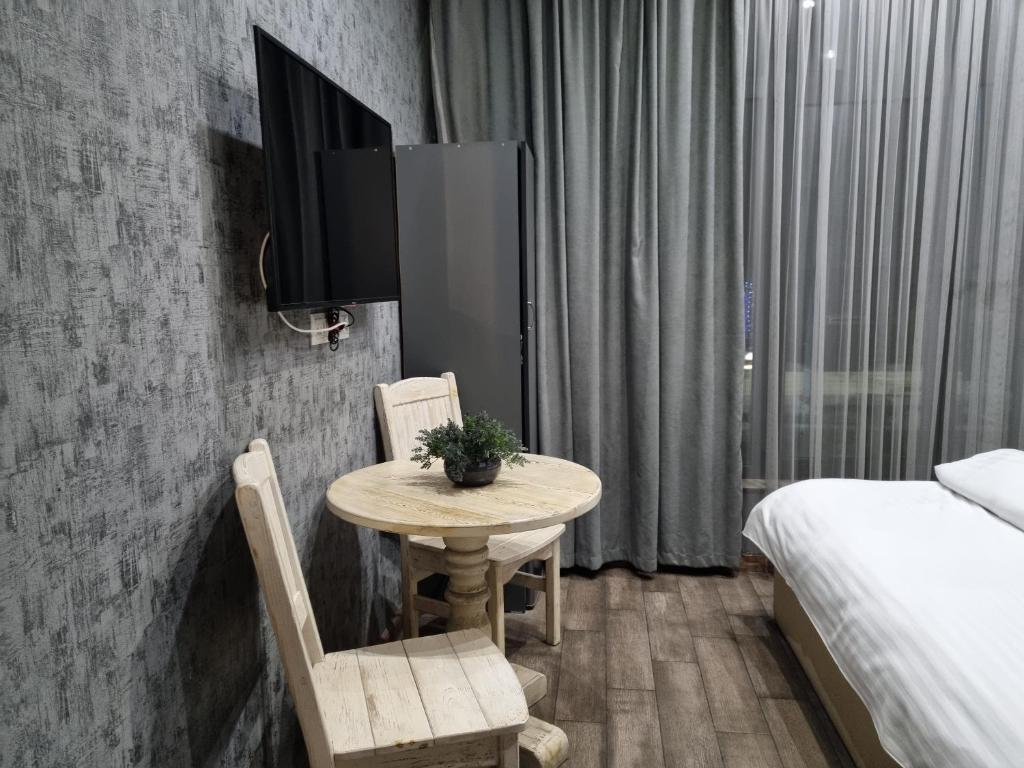 Postel nebo postele na pokoji v ubytování Day Inn hotel