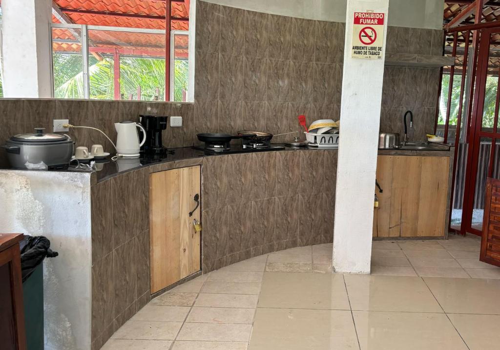 Kuchyň nebo kuchyňský kout v ubytování Hotel Coco Beach