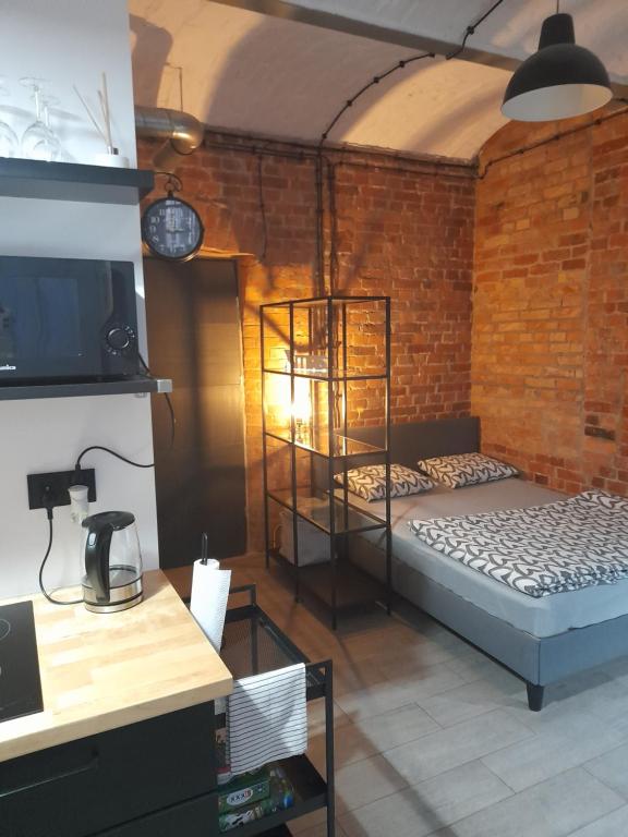 Posteľ alebo postele v izbe v ubytovaní Studio Loft apartament 5 min od Starego Rynku, Poznań NETFLIX