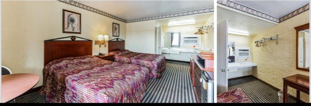 En eller flere senge i et værelse på Regency Inn