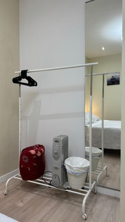Posteľ alebo postele v izbe v ubytovaní HABITACION CENTRAL CON WIFI