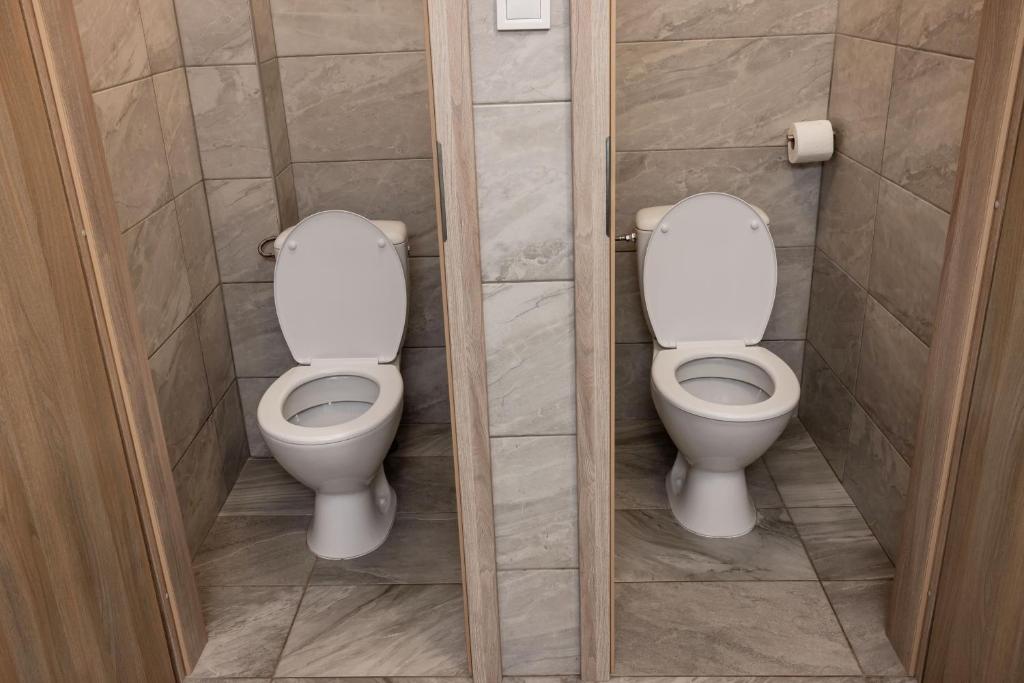 Koupelna v ubytování Penzion a Restaurace Kamínek