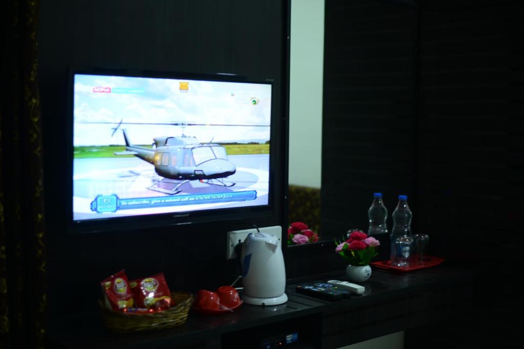 TV a/nebo společenská místnost v ubytování Hotel Nest International