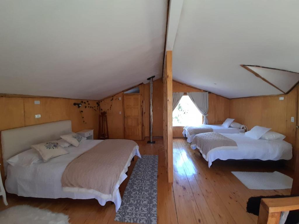 Postel nebo postele na pokoji v ubytování Cabaña Casa Morada