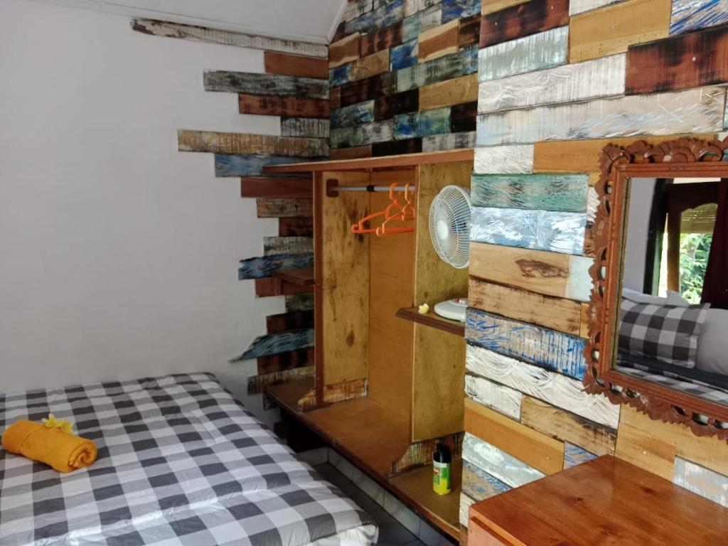 Postel nebo postele na pokoji v ubytování Wikan House