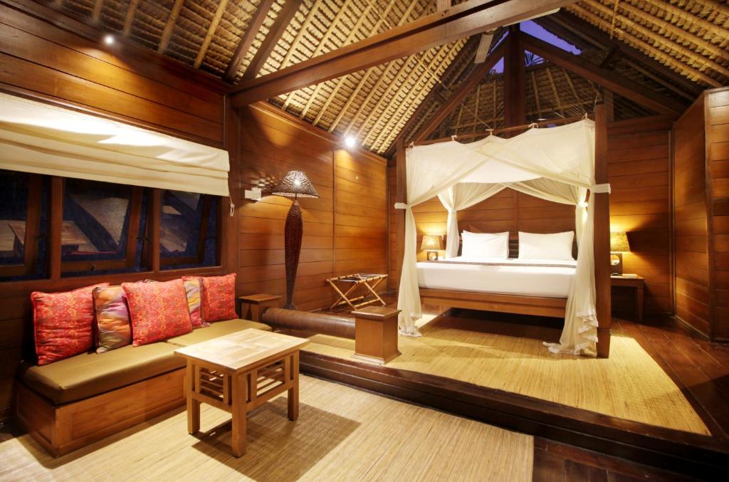 Postel nebo postele na pokoji v ubytování Tegal Sari Accommodation Ubud